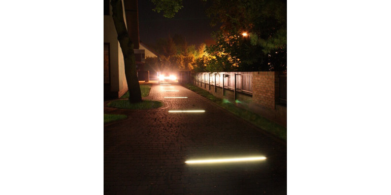 Linear backlight for entry from paving stones